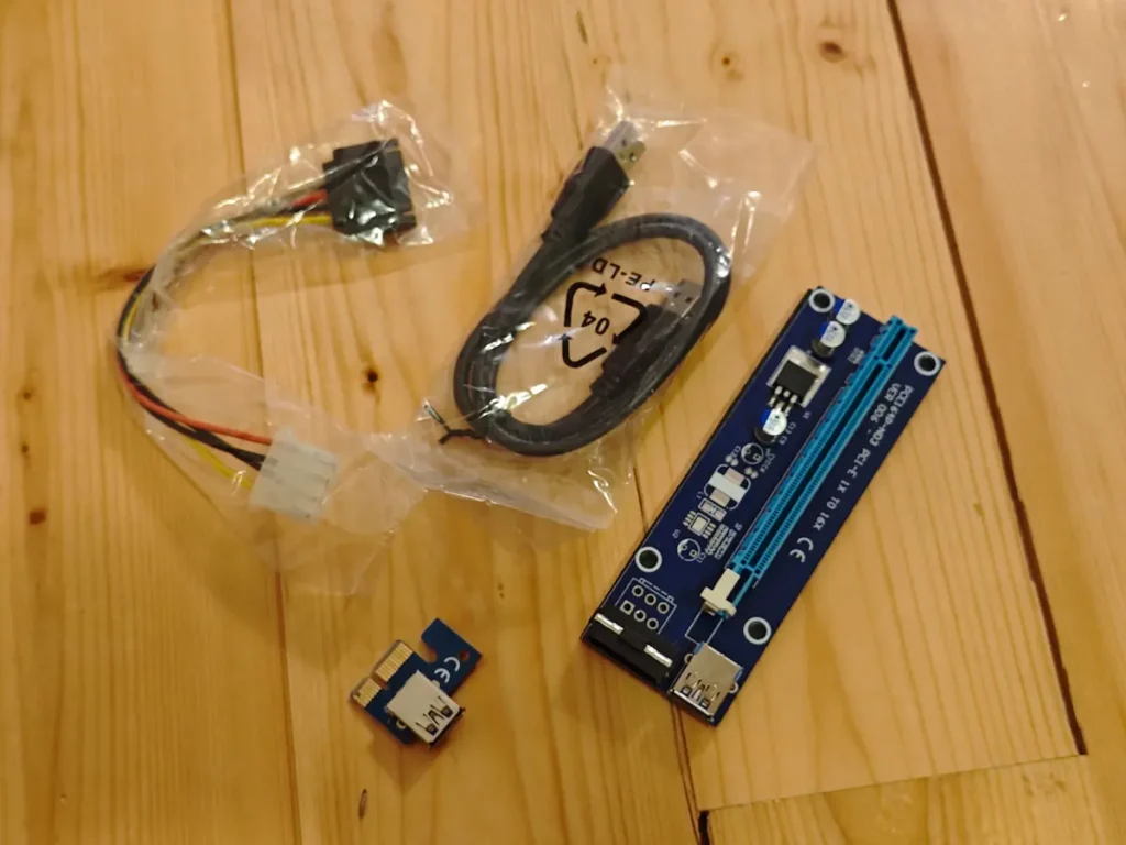 Komponente za spajanje grafičkih kartica na mining rig, pci-e riser i adapter za napajanje
